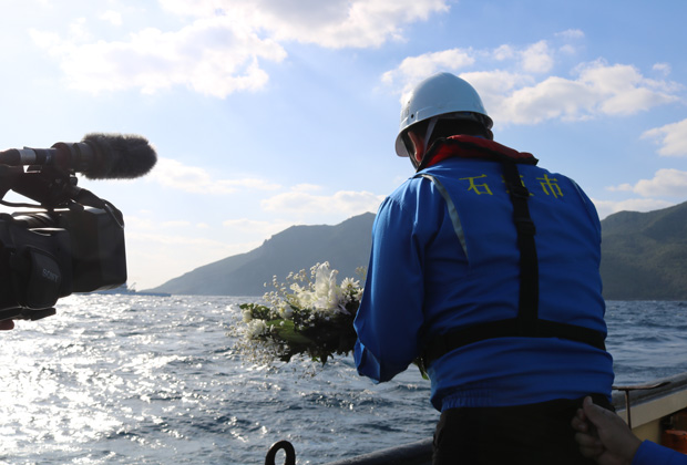 Scenes from a memorial service at sea 